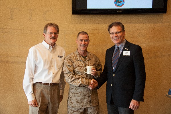 Together at the August luncheon are (l-r) Daniel O'Donnell, vice president for business development at Network Critical; Col. Standfield; and Mark Witzel, chapter president.